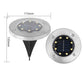 Stainless steel solar-powered ground light with 8 LED bulbs