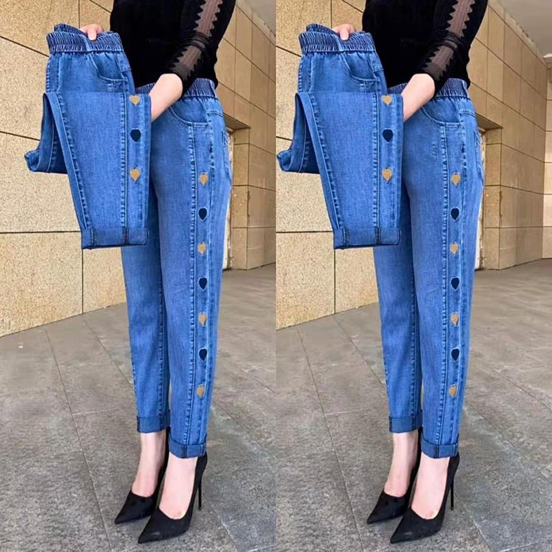 🔥 Kvinnors högelasticitet hjärtmönster broderade jeans