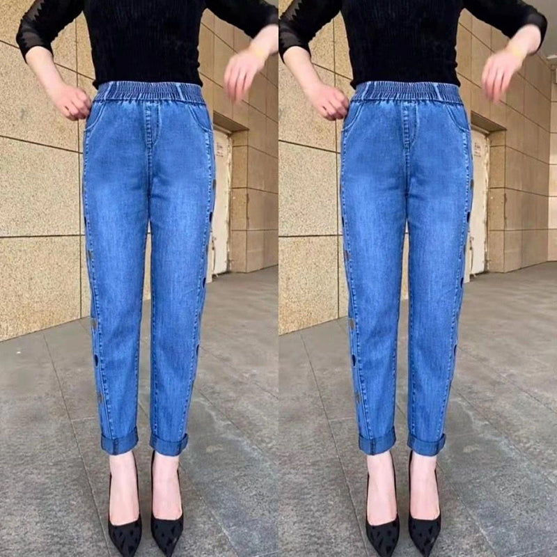 🔥 Kvinnors högelasticitet hjärtmönster broderade jeans