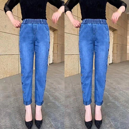 🔥 Kvinnors högelasticitet hjärtmönster broderade jeans