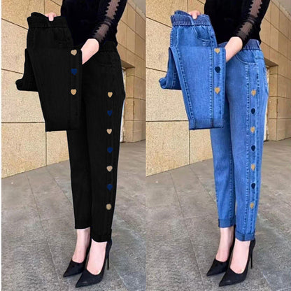 🔥 Kvinnors högelasticitet hjärtmönster broderade jeans