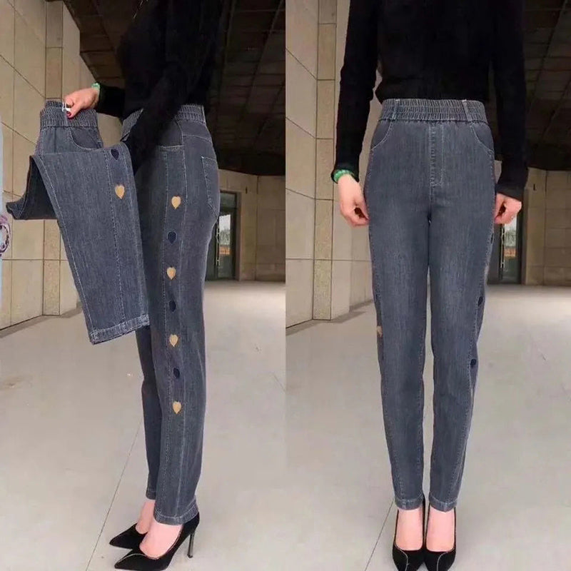 🔥 Kvinnors högelasticitet hjärtmönster broderade jeans