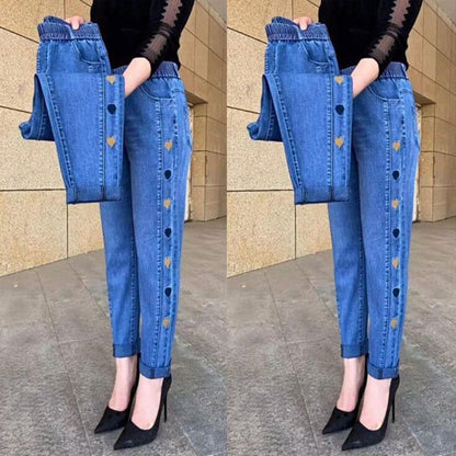 🔥 Kvinnors högelasticitet hjärtmönster broderade jeans